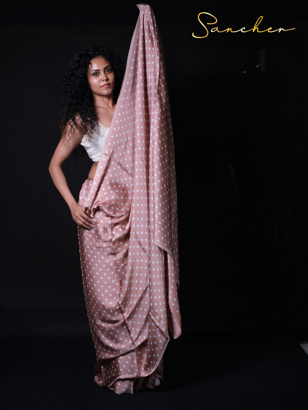Trendy yet timeless polka dot modal silk saree in soft pink shade from Sancher collection