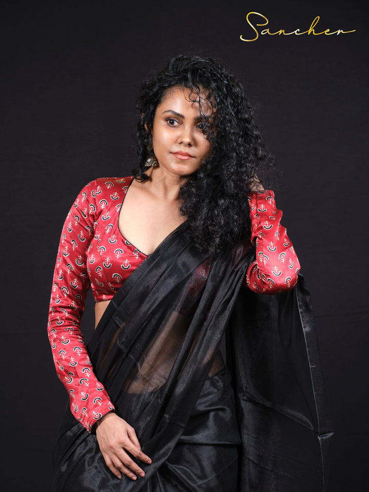 Premium mul zari fabric close-up showing metallic thread work and cotton texture quality