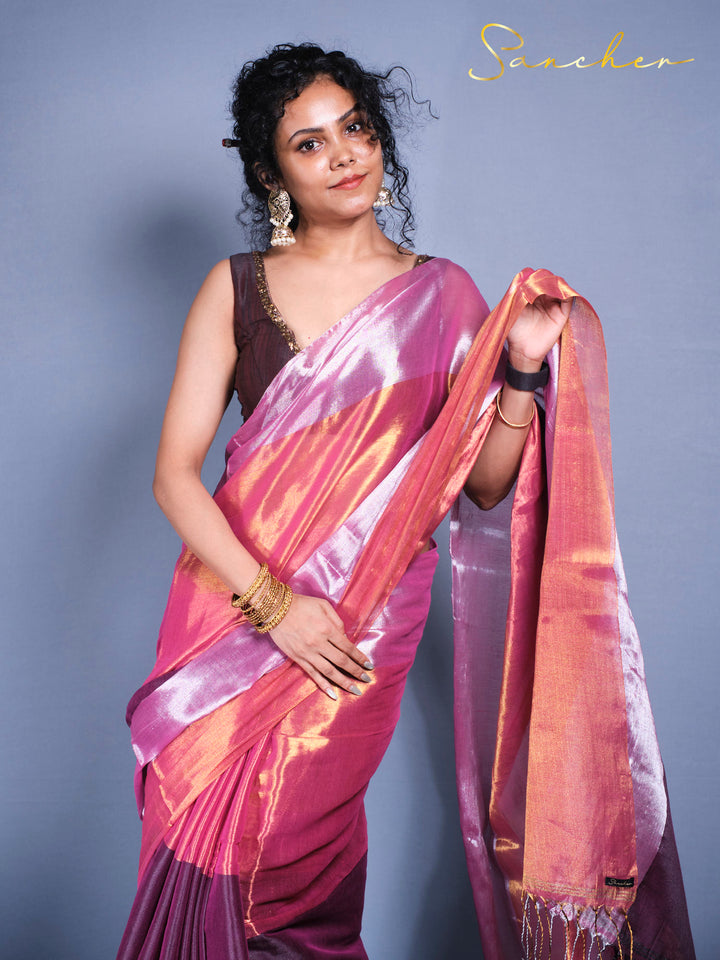 Close up view of woman in elegant Mul Zari cotton saree with traditional earrings and gold bangles