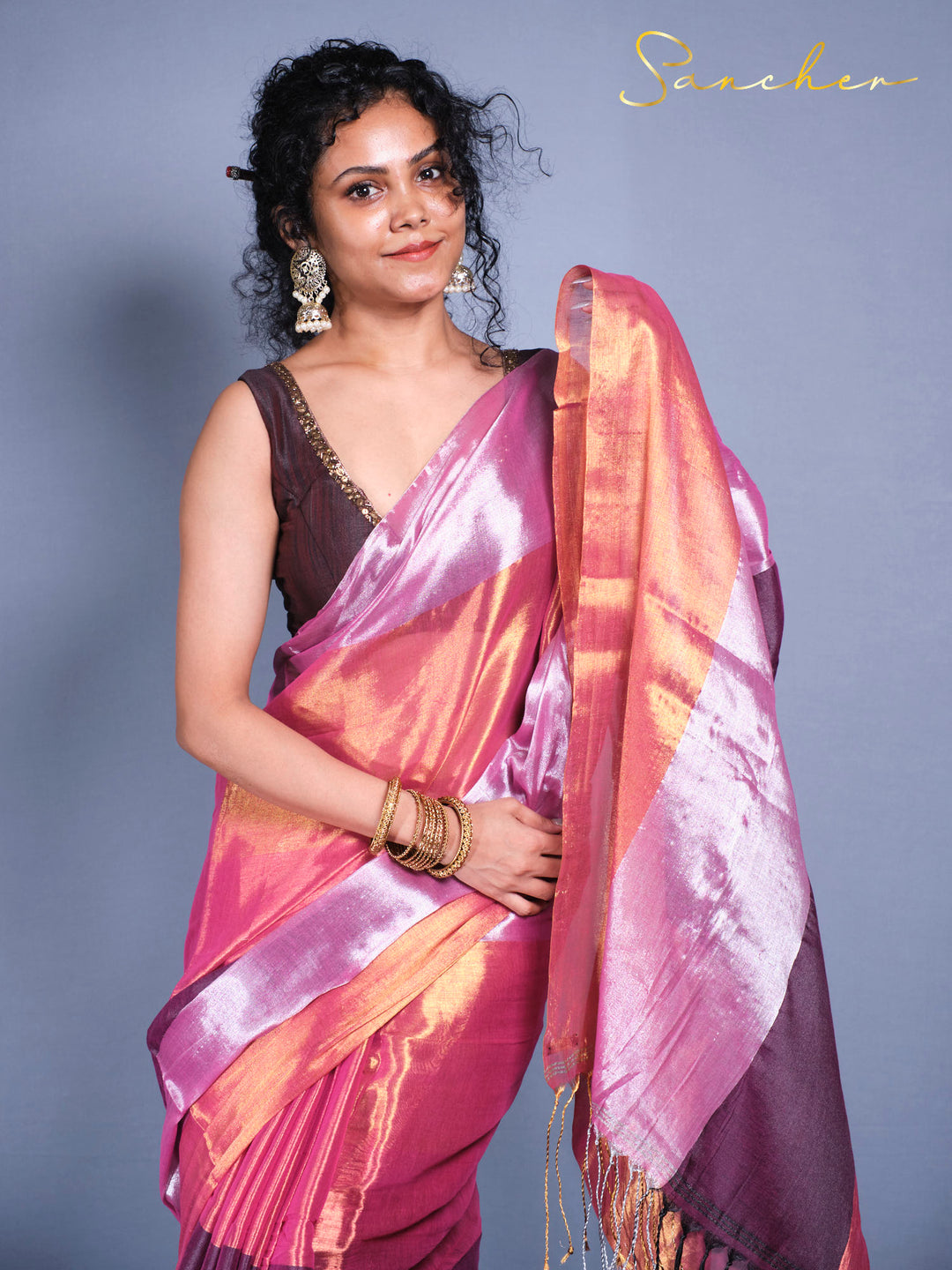 Close up view of Designer Mul Zari cotton saree in sunset colors with traditional Indian styling and comfortable fabric.