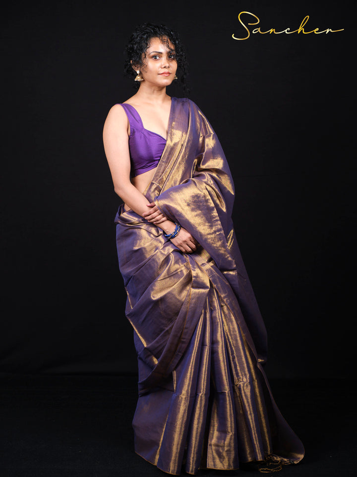 Comfortable cotton saree with traditional zari work in purple and gold colors