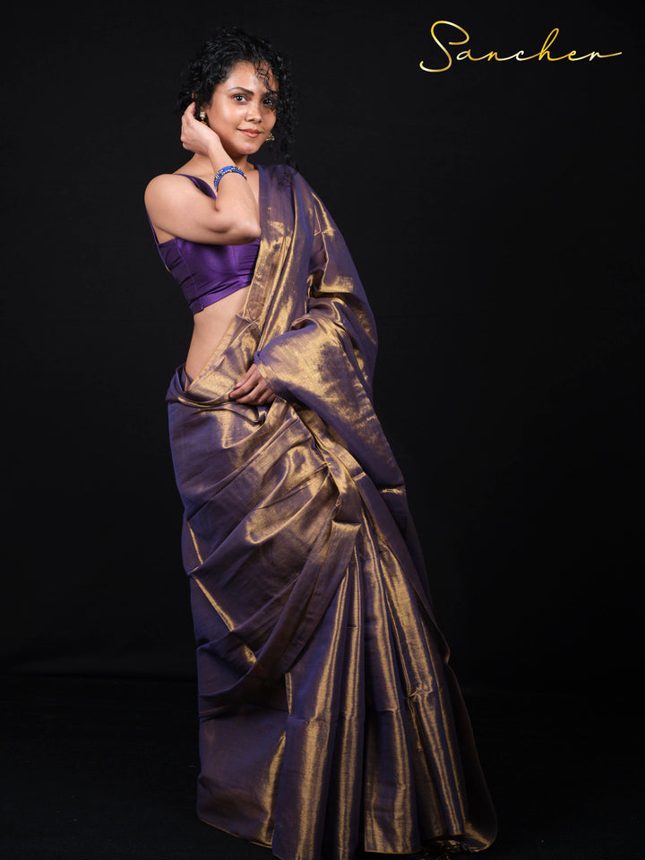 Beautiful lady in Midnight Muse purple cotton saree with zari work design