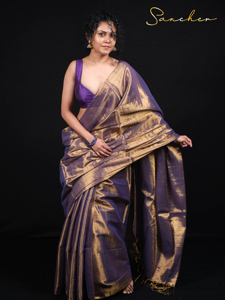 Designer Mul Zari saree in deep purple color with shimmering gold details