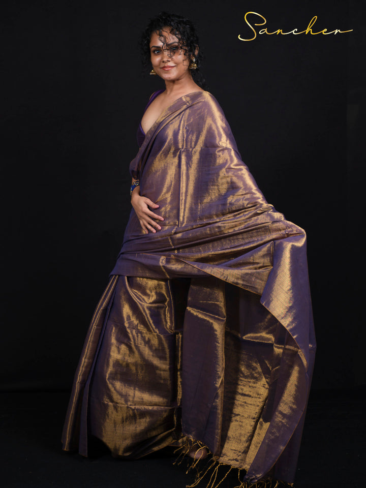 Pure Mul Zari saree showing intricate golden threadwork on purple fabric