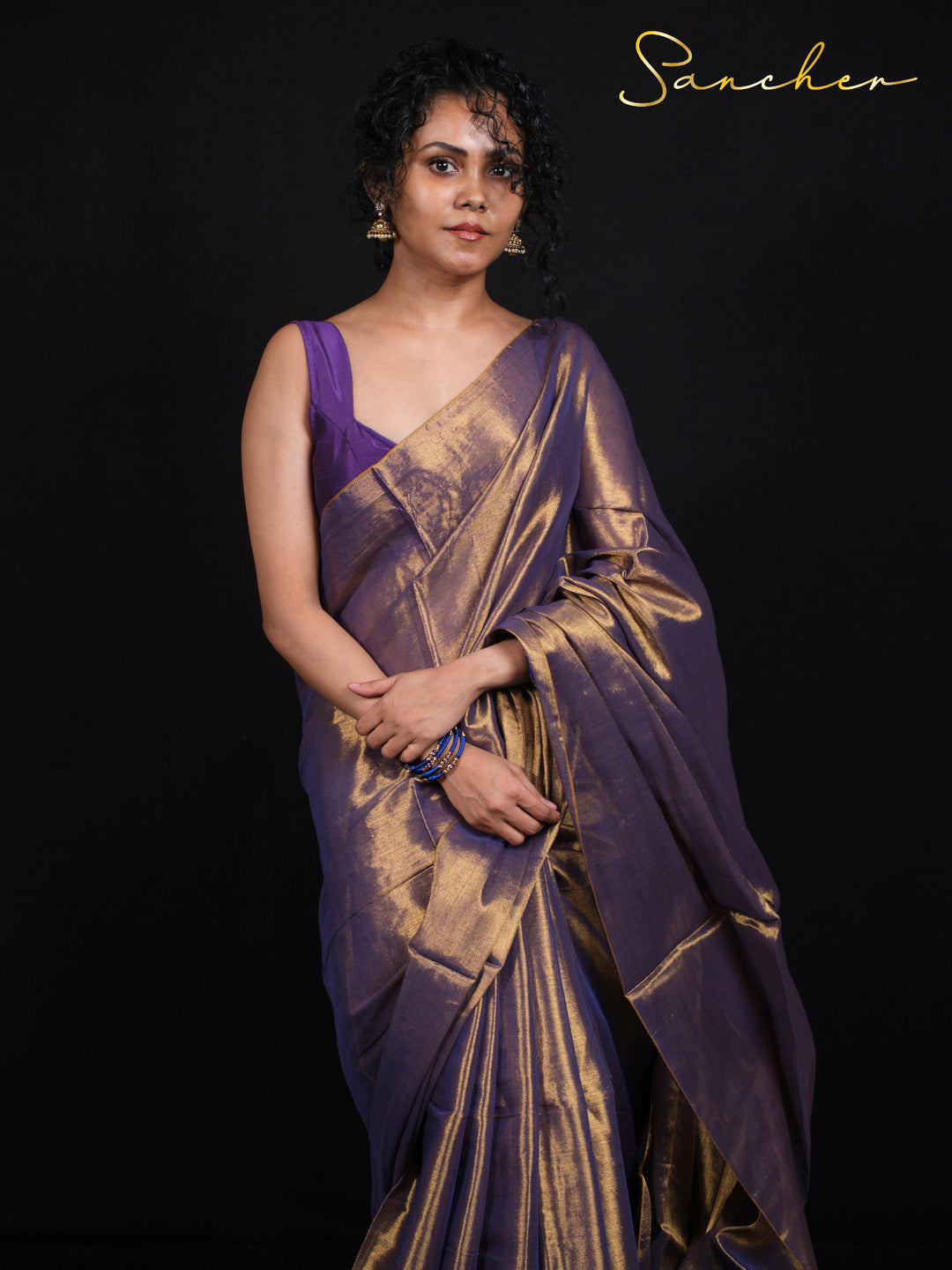 Party wear purple saree with matching blouse and beautiful draping style
