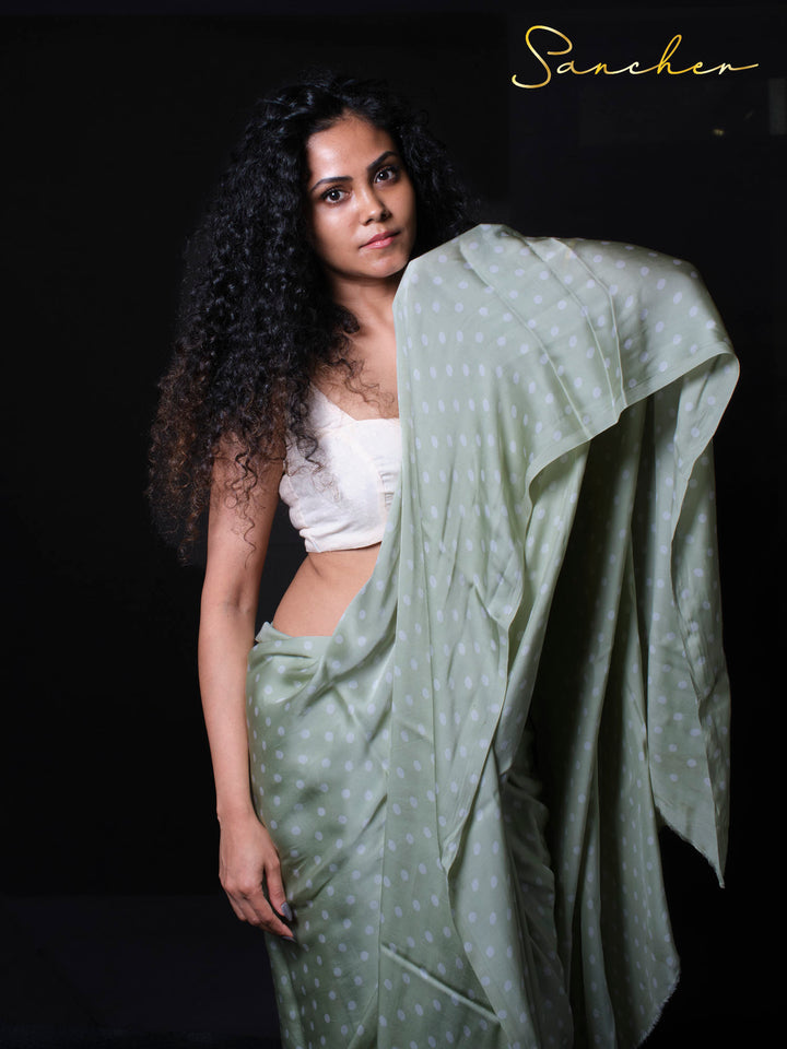 Designer modal silk saree draped elegantly showing fabric flow and movement