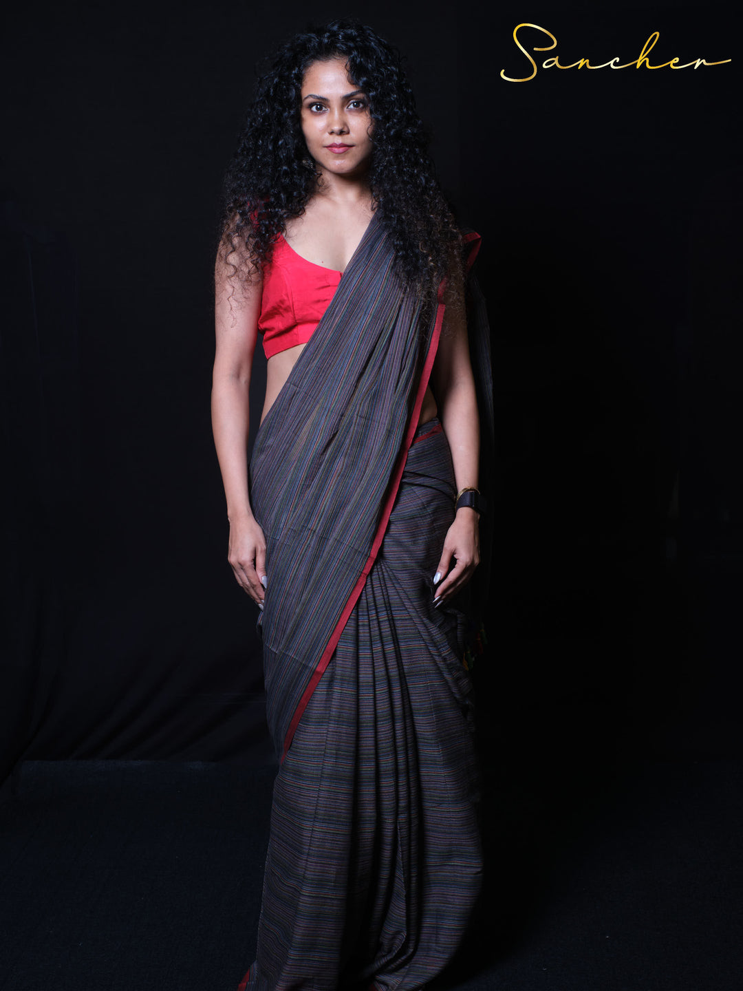 Coastal Charm mulmul cotton saree in Green Color  with rainbow pinstripes and multicolored edge details