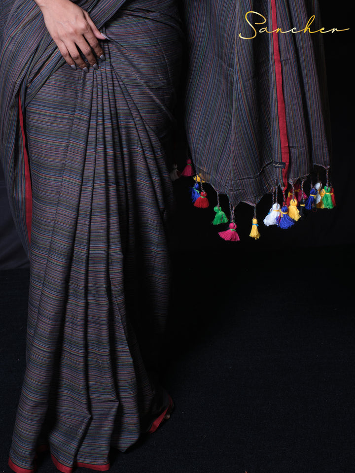 Coastal Charm handwoven Green saree with multicolored tassels and red blouse piece