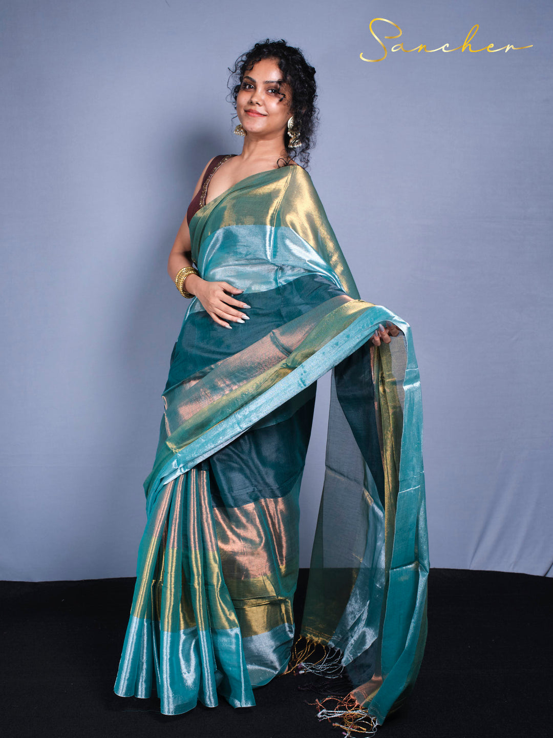Pure mul cotton zari saree in ocean teal color with metallic accents for women