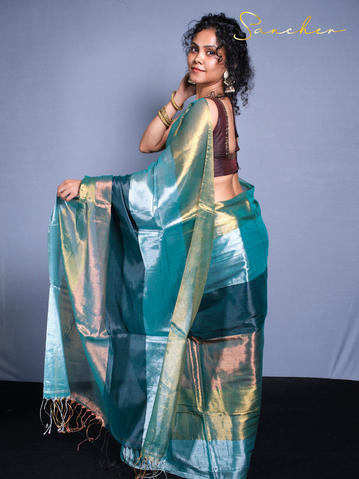 Back view of mul zari saree displaying intricate zari work and comfortable cotton fabric