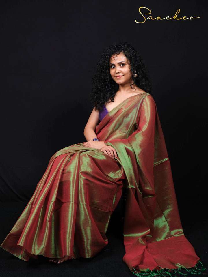 Premium mul zari saree online showing elegant draping and shimmering fabric texture