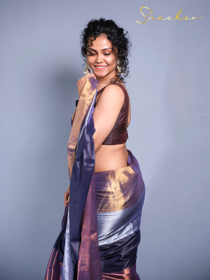 Side pose of showcasing Designer Mul Zari saree with iridescent fabric perfect for festivals