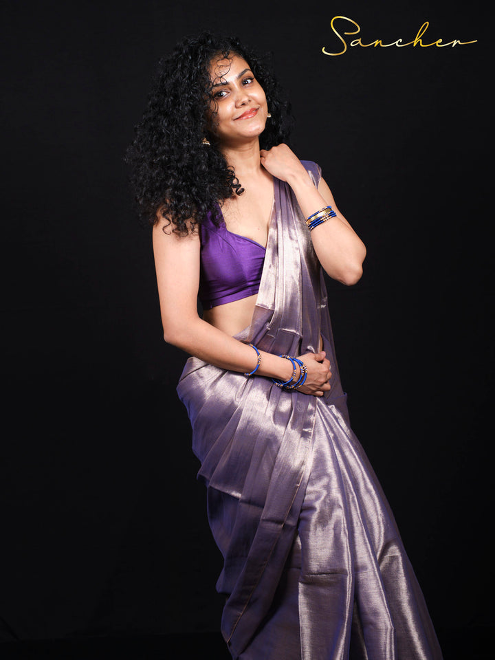 Elegant purple mul zari cotton saree with metallic finish and fringe border details