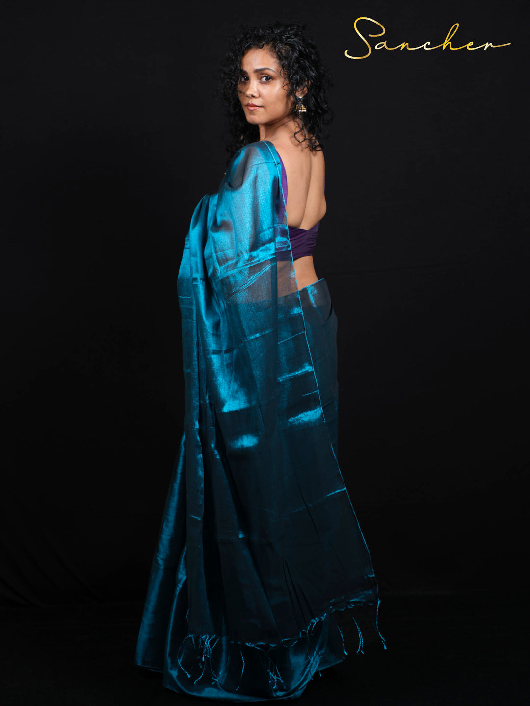 Full length Side pose view of designer Mul Zari saree perfect for festival celebrations and party occasions
