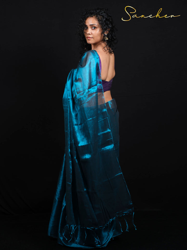 Full length Side pose view of designer Mul Zari saree perfect for festival celebrations and party occasions