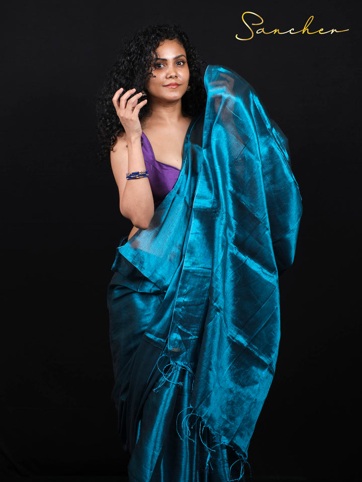 Elegant Mul Zari saree styling with curly hair showing versatile look for modern women.