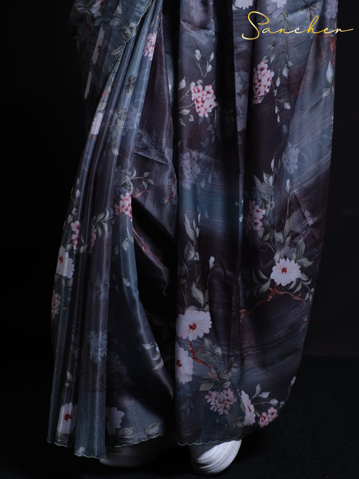 Close-up of Night Flowers Premium Satin Silk Saree showing delicate white and pink floral details