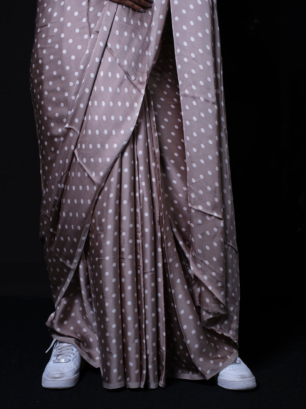 Close up detail of polka dot modal silk saree showing fabric quality and pattern design