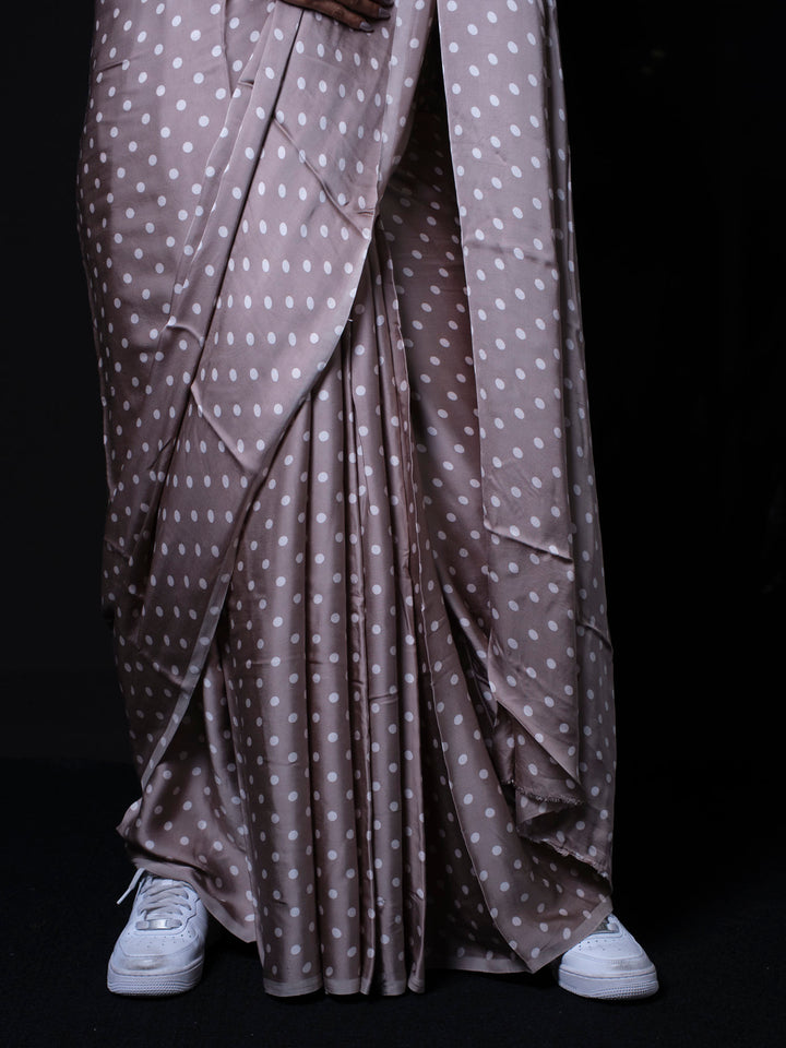 Close up detail of polka dot modal silk saree showing fabric quality and pattern design
