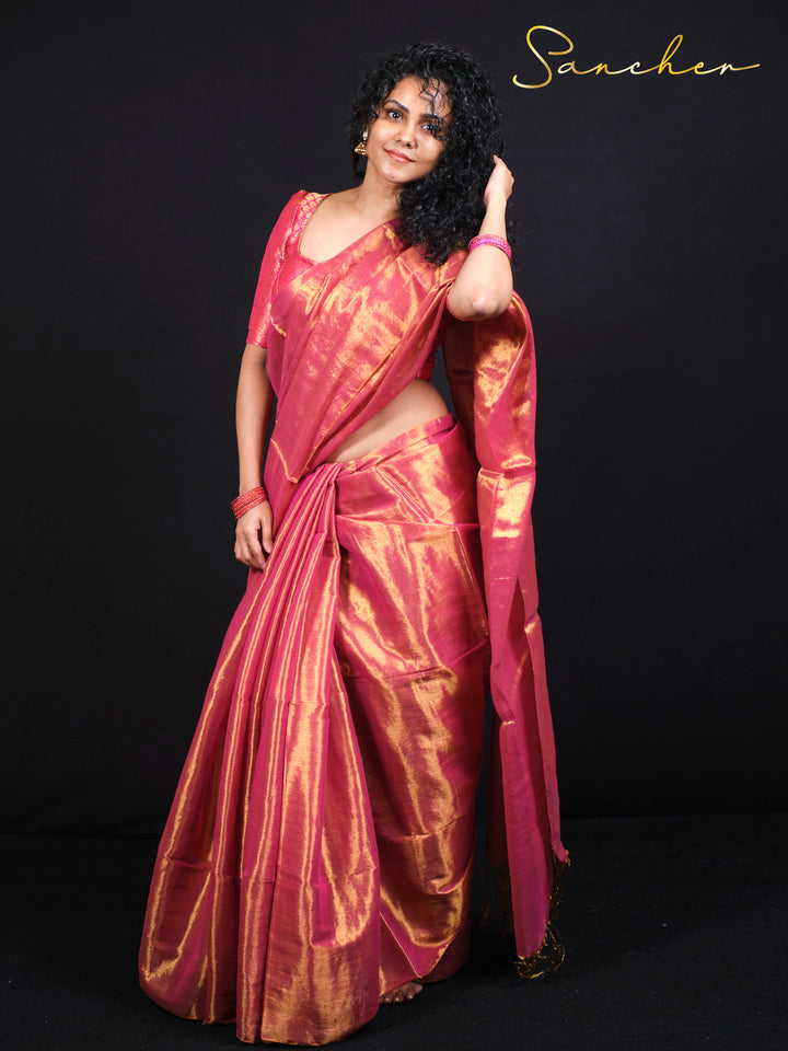Authentic Indian pink zari saree with traditional craftsmanship and elegant draping
