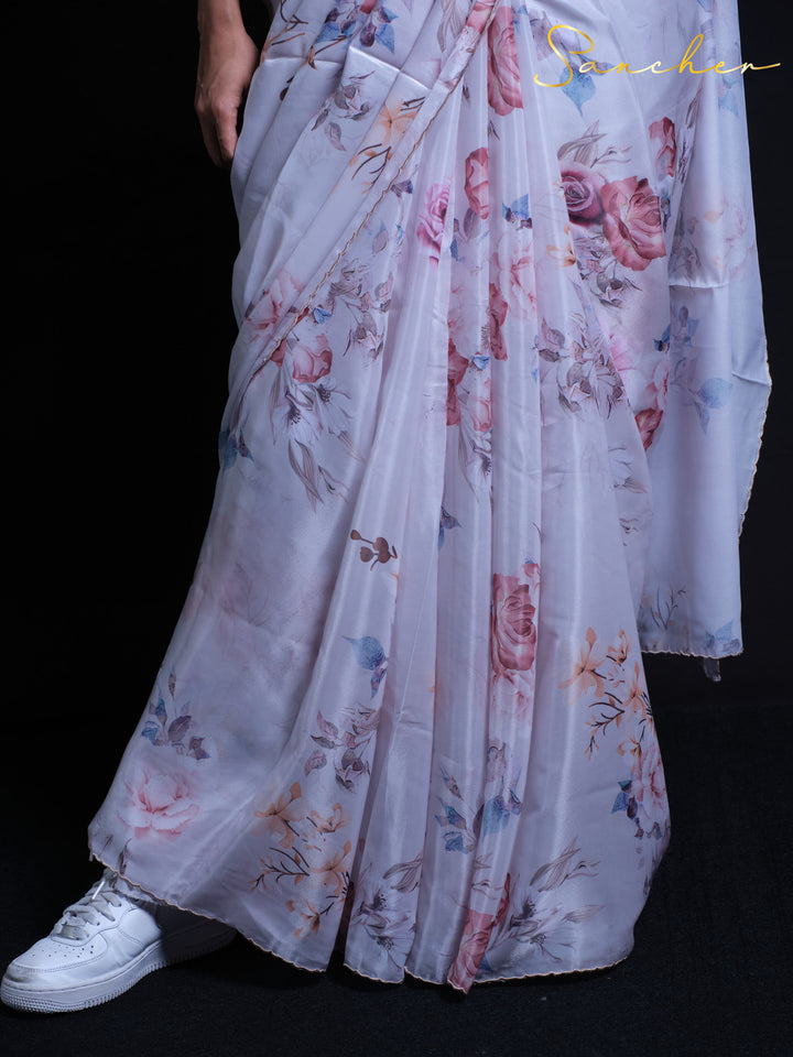 Close-up of Rose Petal satin silk saree showing intricate floral print details