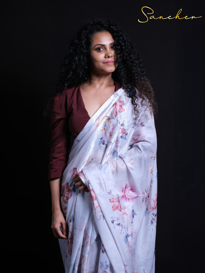 Close-up of Rose Petal satin silk saree showing intricate floral print details