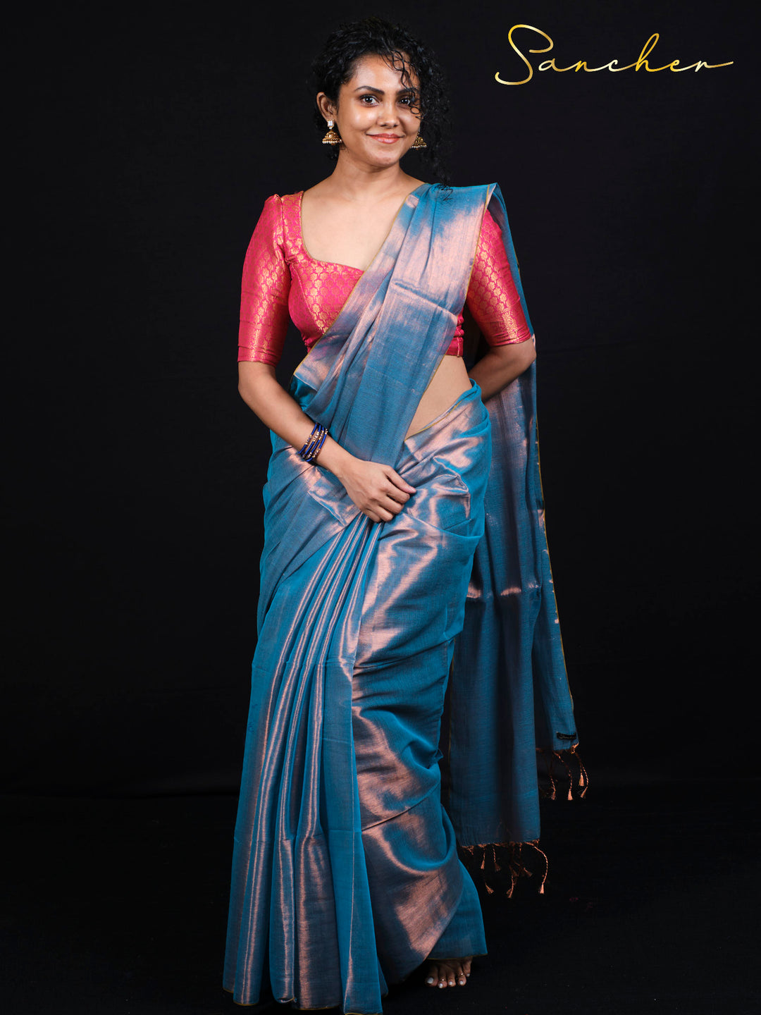 Full length view of Sancher Serence Sea Blue Mul Zari saree displaying ocean-inspired shimmer and elegant draping