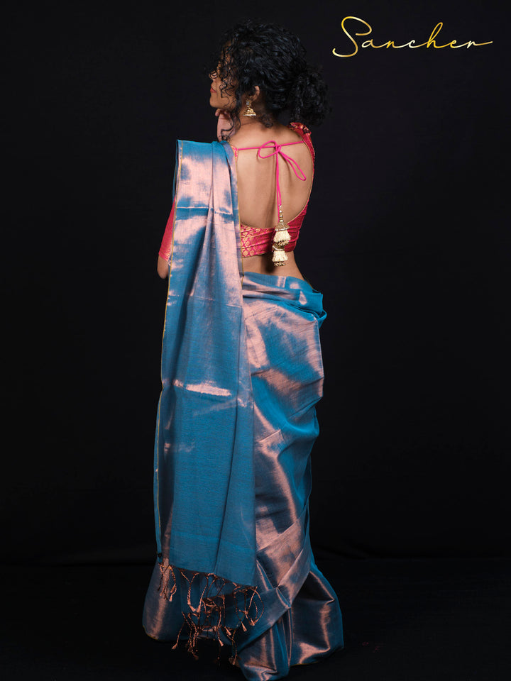 Back view of Sancher Sea Blue Mul Zari saree showing pink brocade blouse with tie-back design