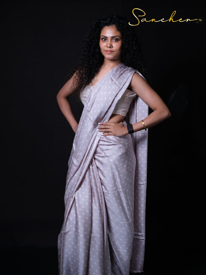 Handwoven modal silk saree in soft purple shade with white polka dots Officce wear