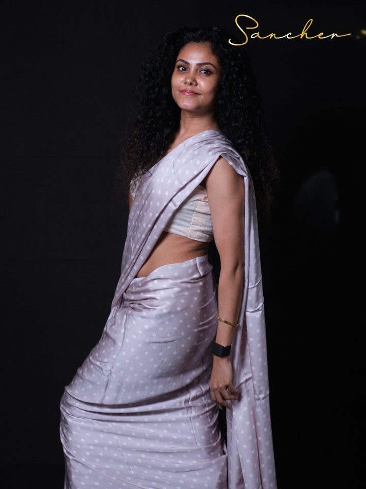 Designer modal silk saree featuring timeless polka dot print and comfortable lightweight fabric