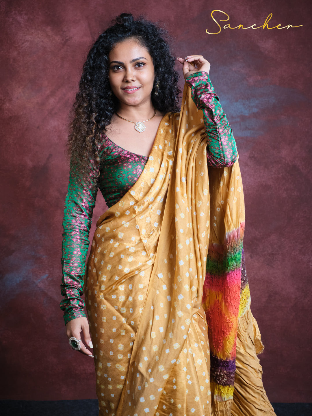 golden bandhani saree