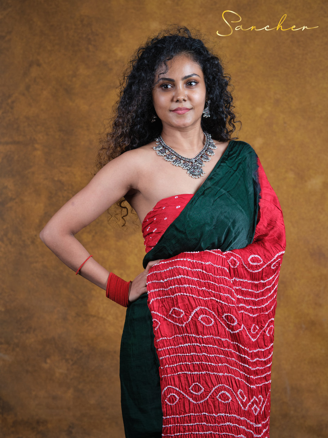 dark green bandhani saree