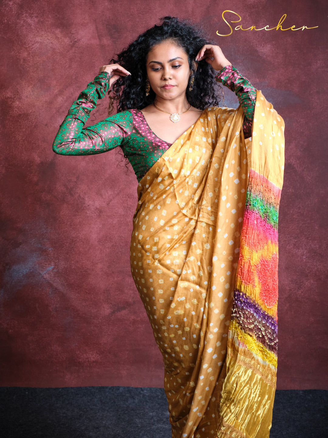 golden bandhani saree