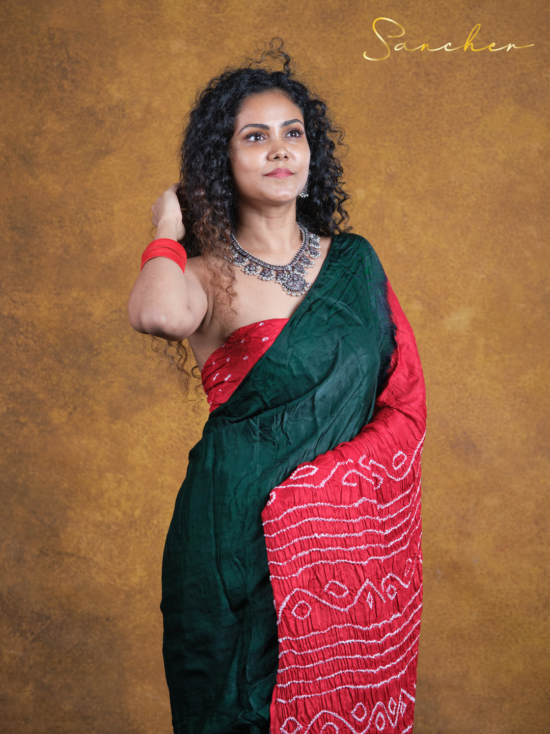 dark green bandhani saree