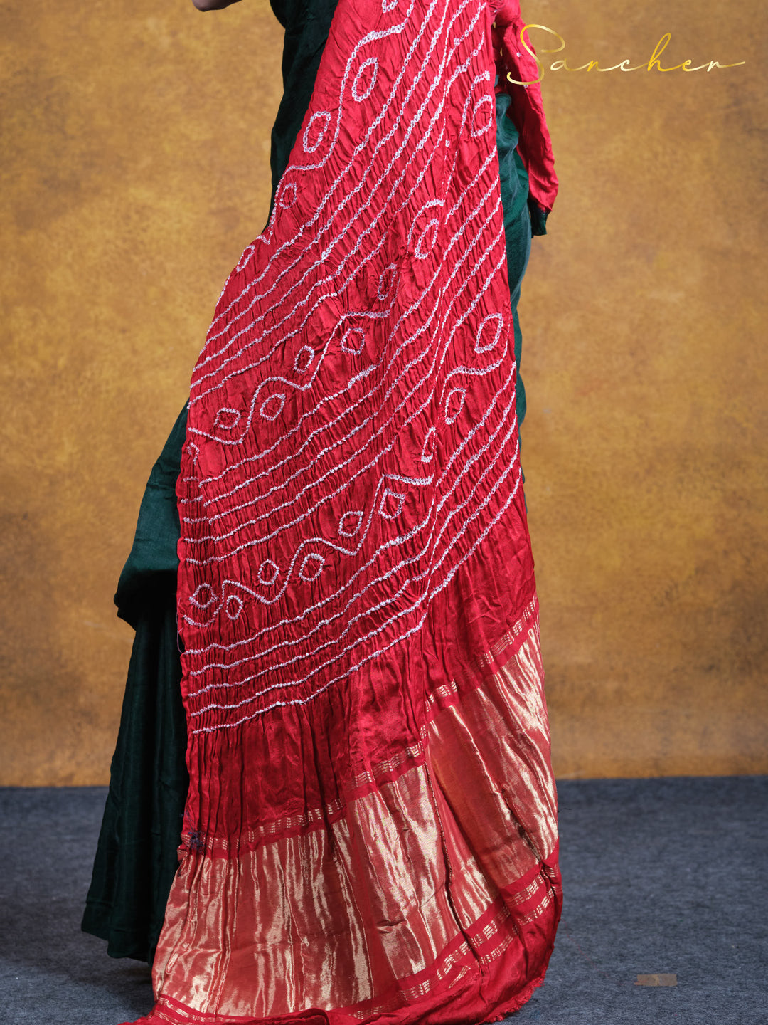 dark green bandhani silk saree