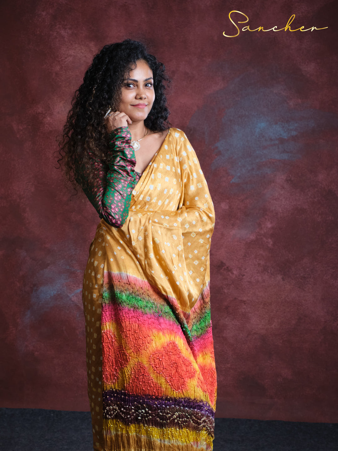 golden bandhani saree