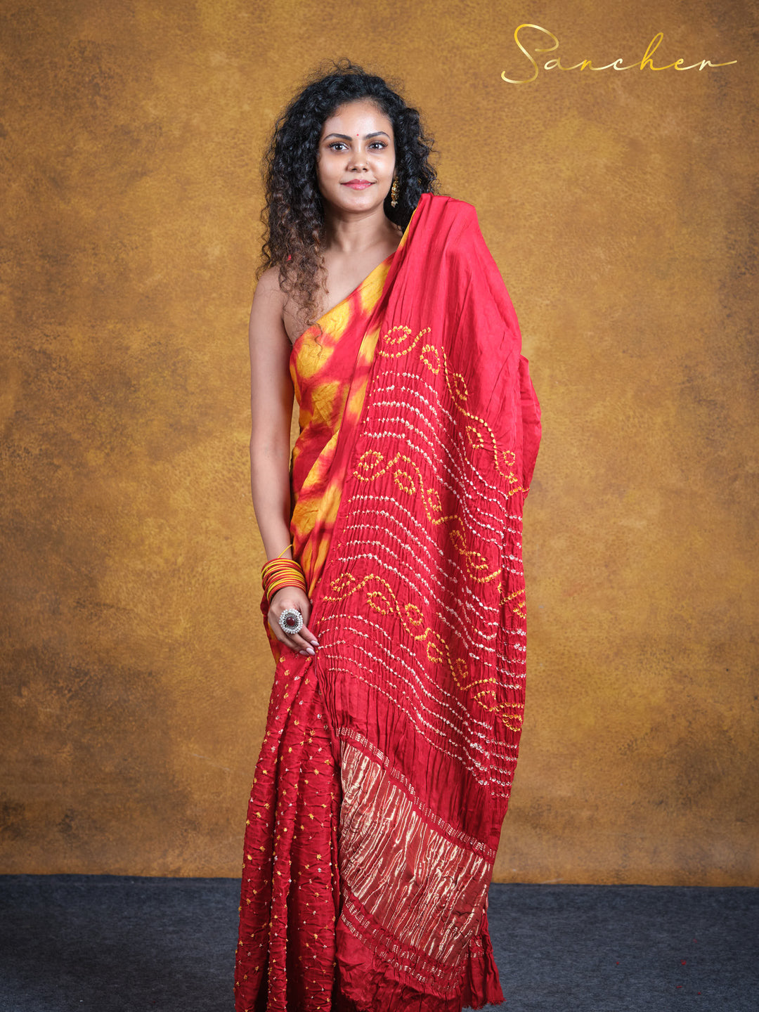 red bandhani silk saree