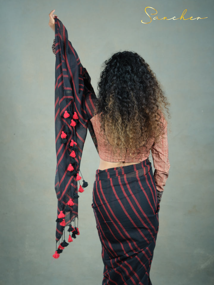 black an red stripe saree